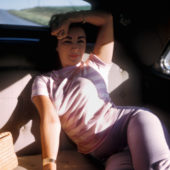 Liz in back of car vert. C LR pg 88